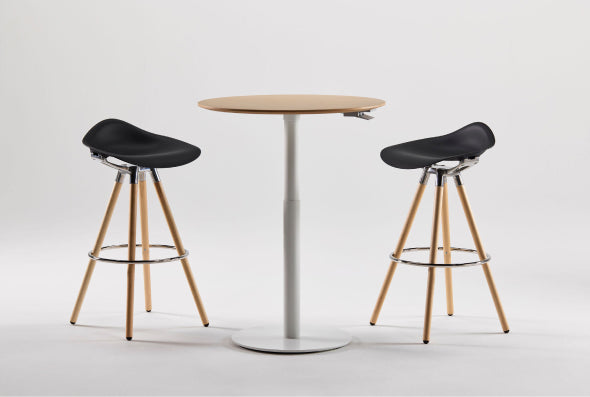 Humanscale Float Gather round table with Sedeo stools in solid wood.