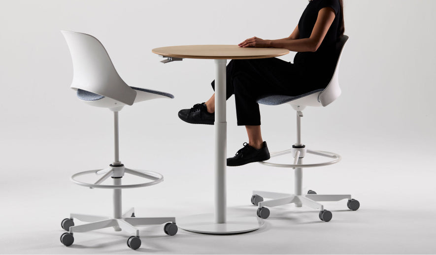 Humanscale Trea high task stool with a foot ring at a Float Gather standing desk